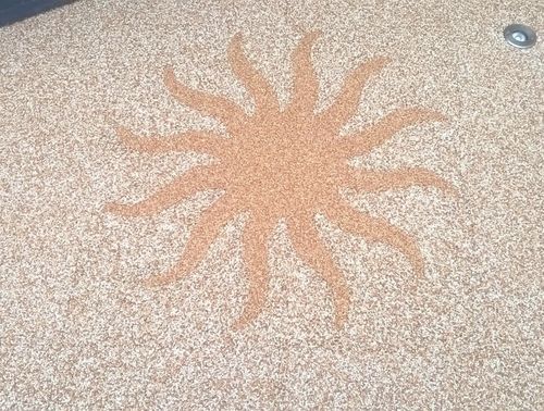 Natursteinteppich Logo Sonne, rund